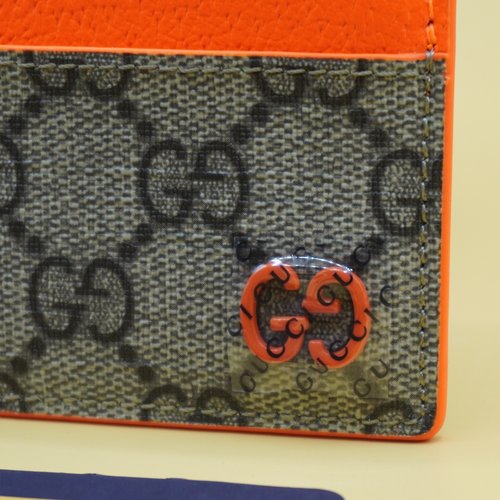 Gucci Orange trim GG card case